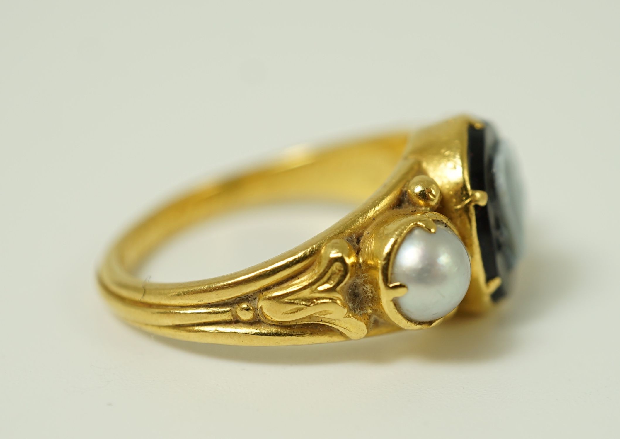 A William IV gold, split pearl and sardonyx set mourning ring